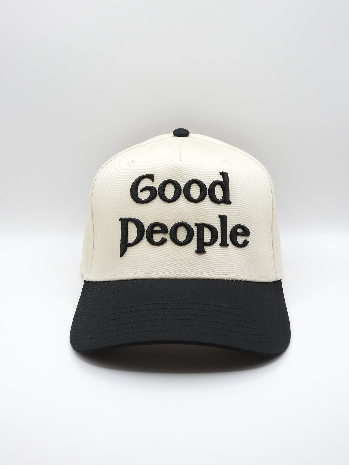 Hat with 'Good People' embroidery on a white background.